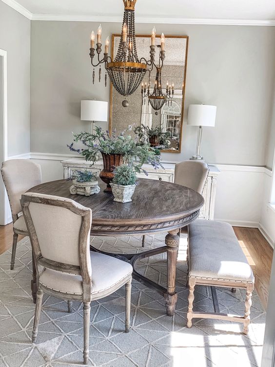 Circular French Finish Dining Set with a Bench