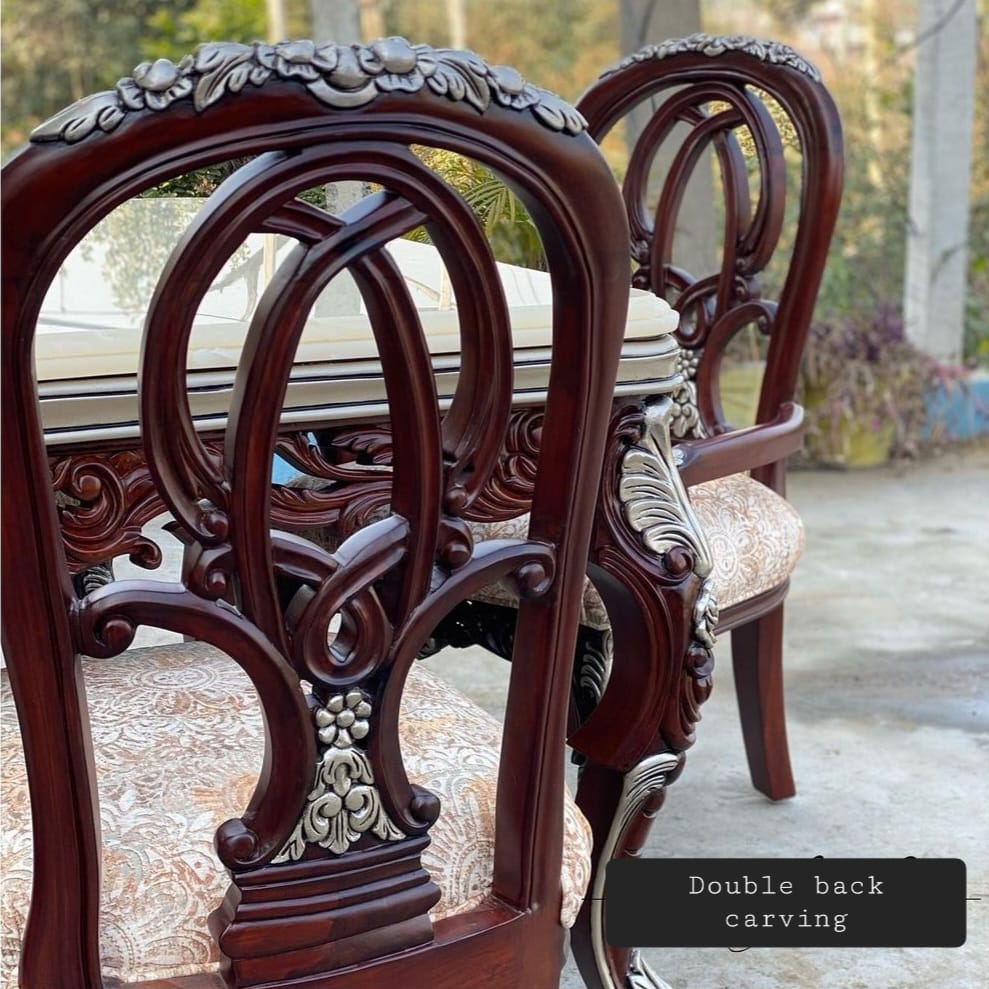 8 Seater Dining set with 95 Sterling Silver work on Chairs.